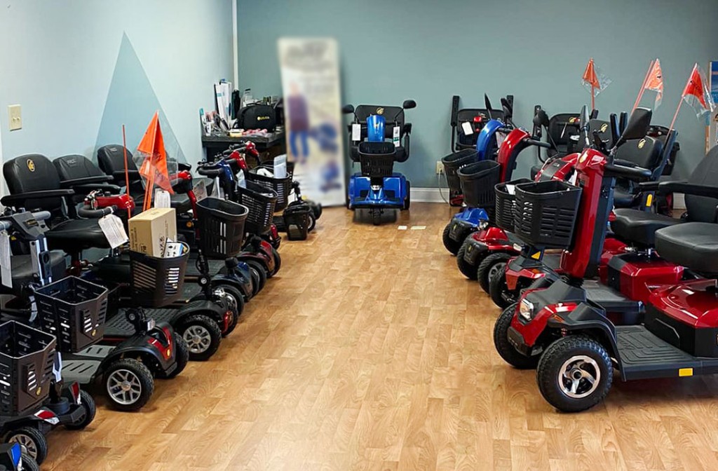 Fleet of mobility scooters ready for event rentals